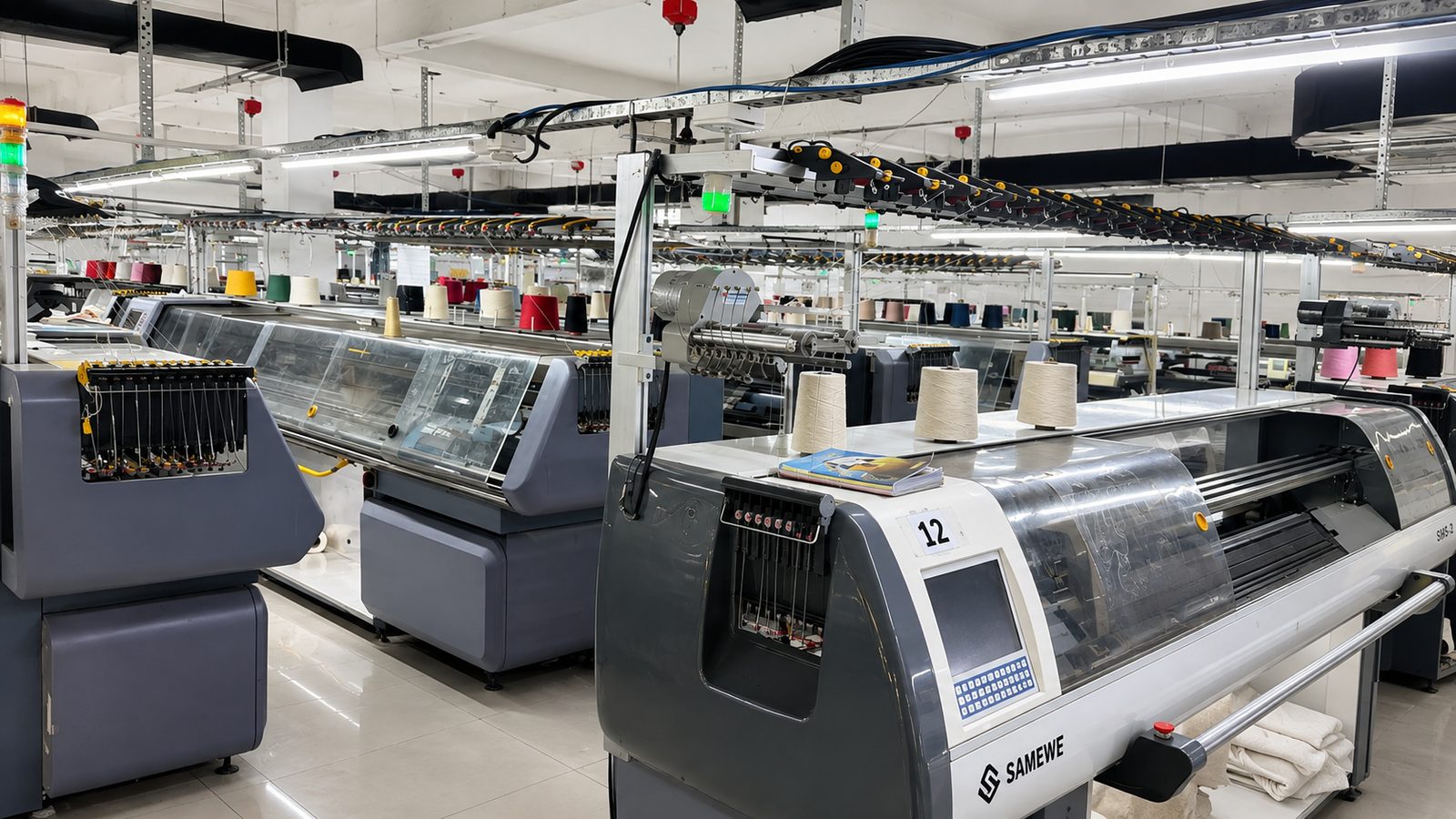 Computerized flat knitting machines at Plot 180